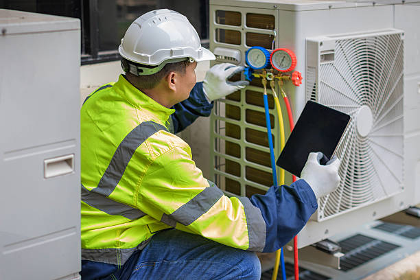 Professional Air Conditioning Repair technician working in Elmwood, IL